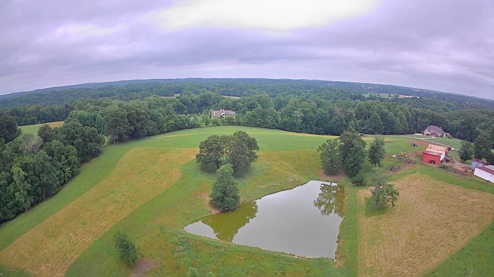 7144 Hall Road Greenbrier, TN 37073 - Photo 43 of 46 a view of a lake in middle of the house