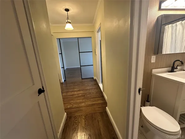 a bathroom with a sink and toilet