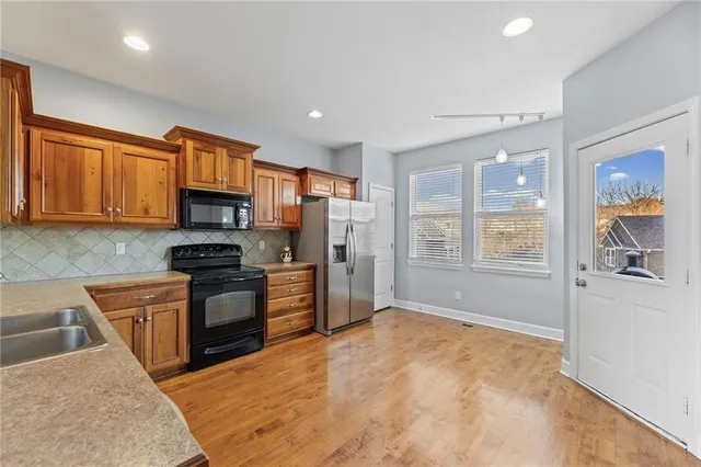 $290,000 | 11173 South Woodsonia Drive, Olathe, KS 66061