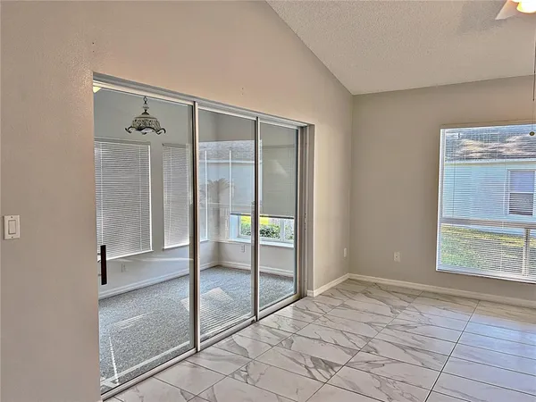 a view of an empty room with window