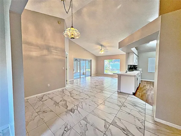a view of a kitchen with a sink