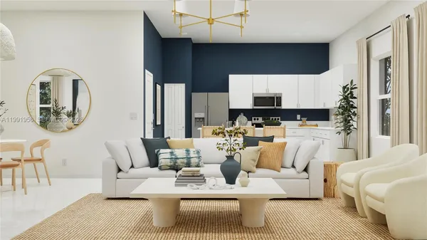 a living room with furniture and a mirror