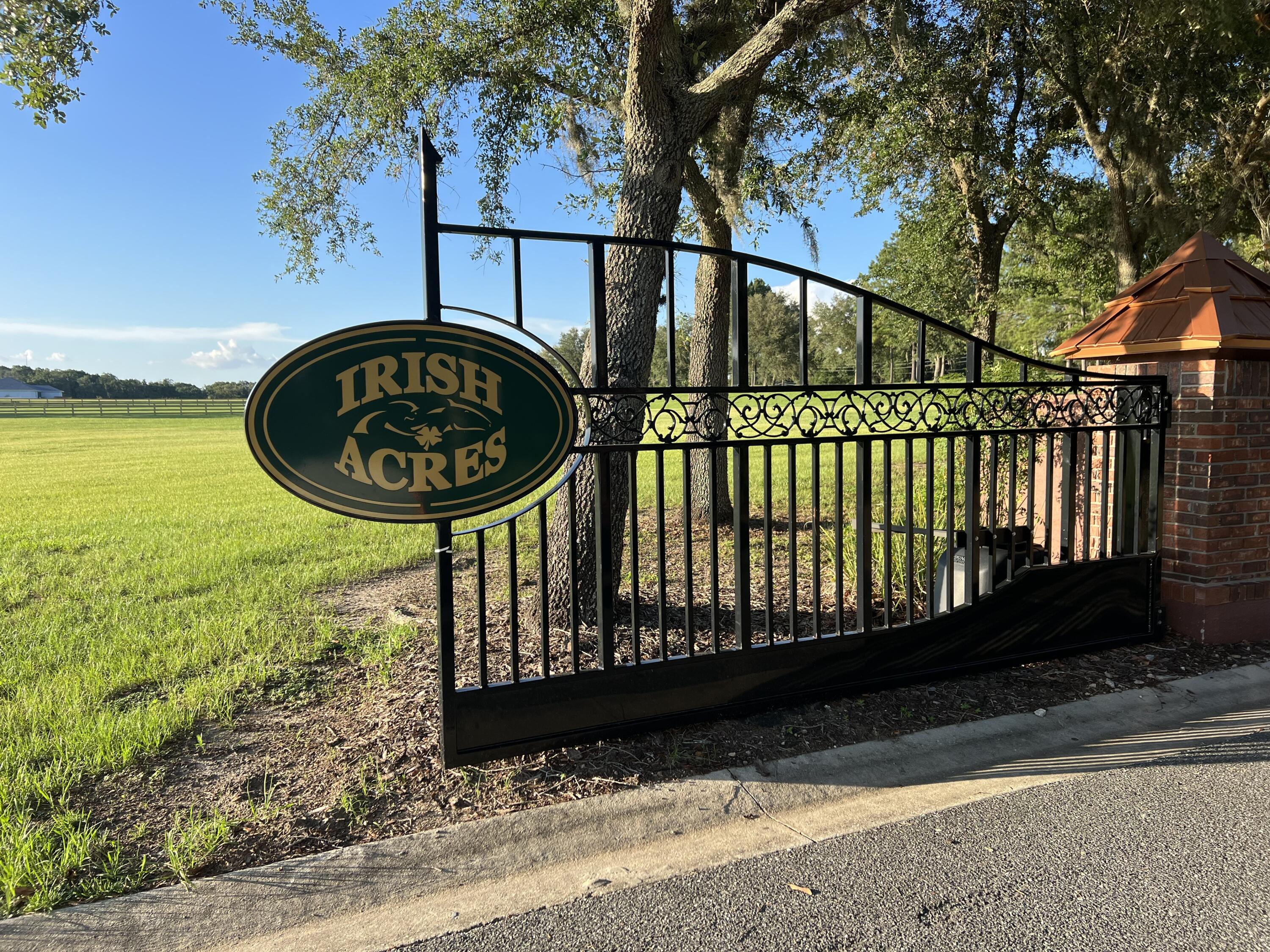 0 Northwest 79th Loop Ocala, FL 34475 - Photo 2 of 11 Gate *IMG_6345 Irish Acres Gate Sign