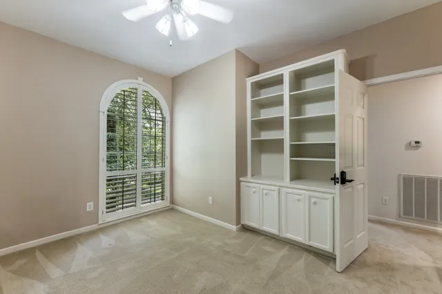 an empty room with windows