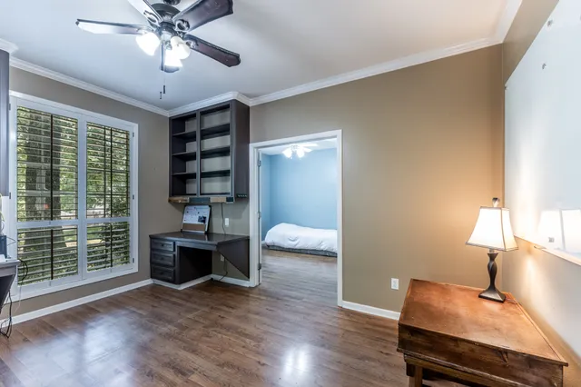a view of workspace with wooden floor