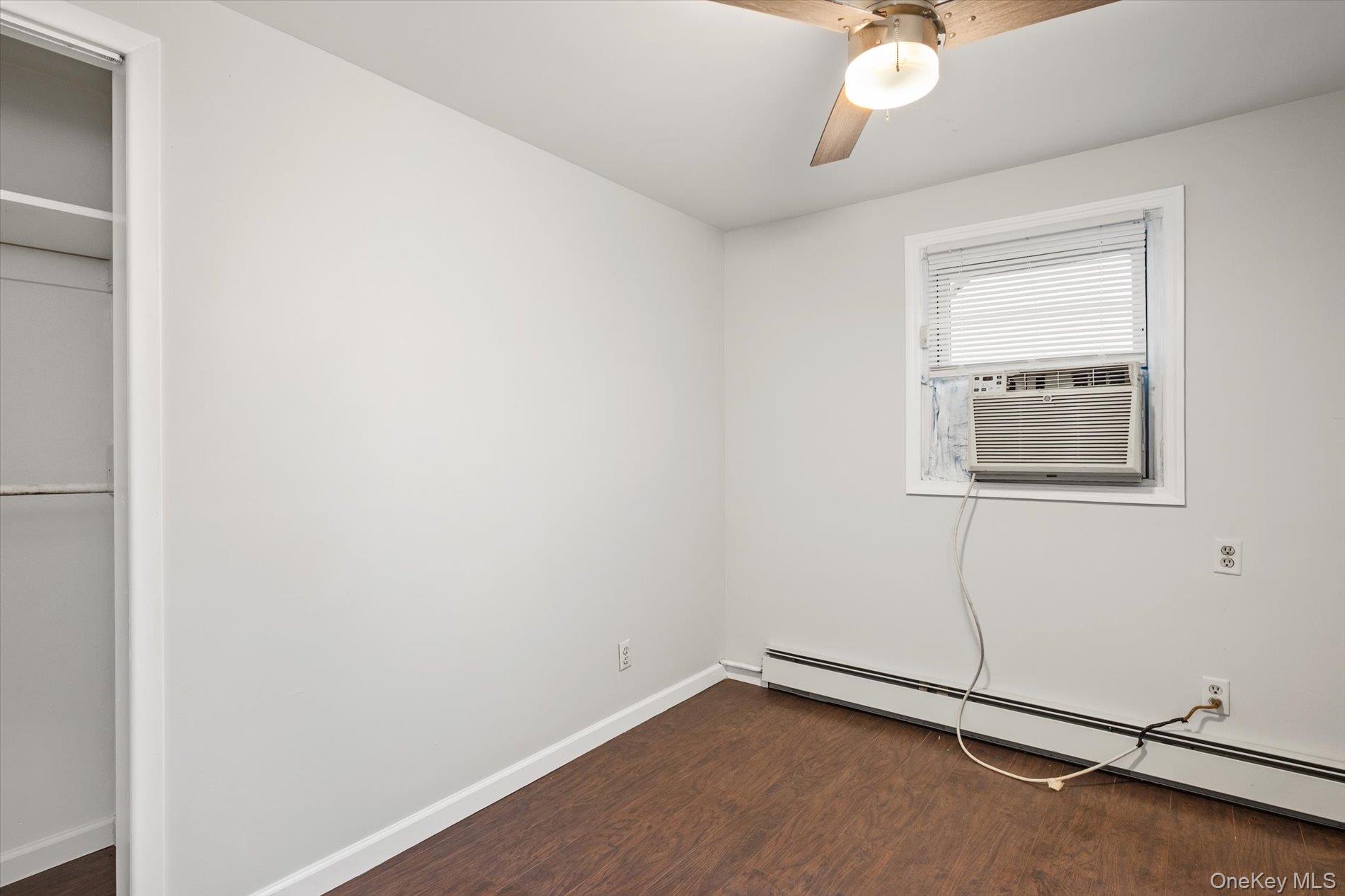 20 Kenneth Avenue Bellmore, NY 11710 - Photo 14 of 24 an empty room with a window