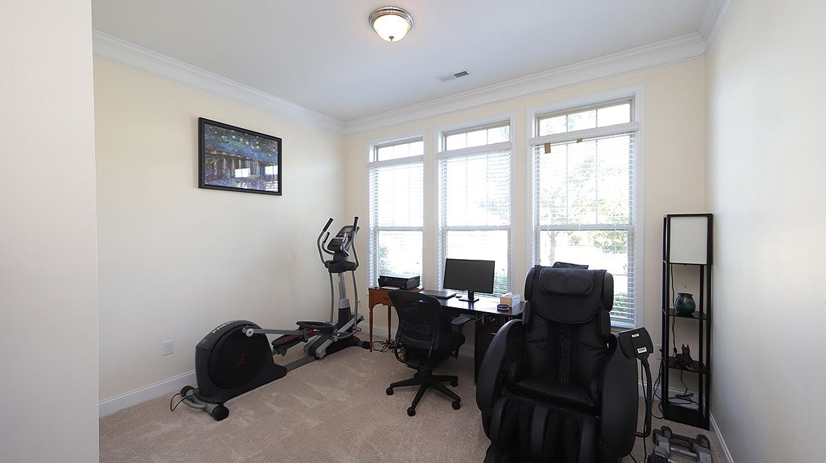 7524 Oakberry Drive Raleigh, NC 27616 - Photo 11 of 22 Currently used as an office this light filled bedroom is a great flex space Bedroom