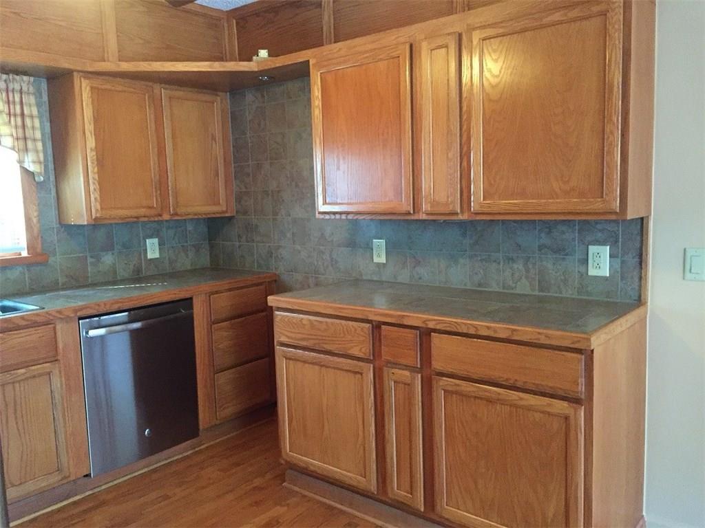 685 Pluto Road Ligonier, PA 15658 - Photo 8 of 25 Ceramic backsplash and counter with storage above