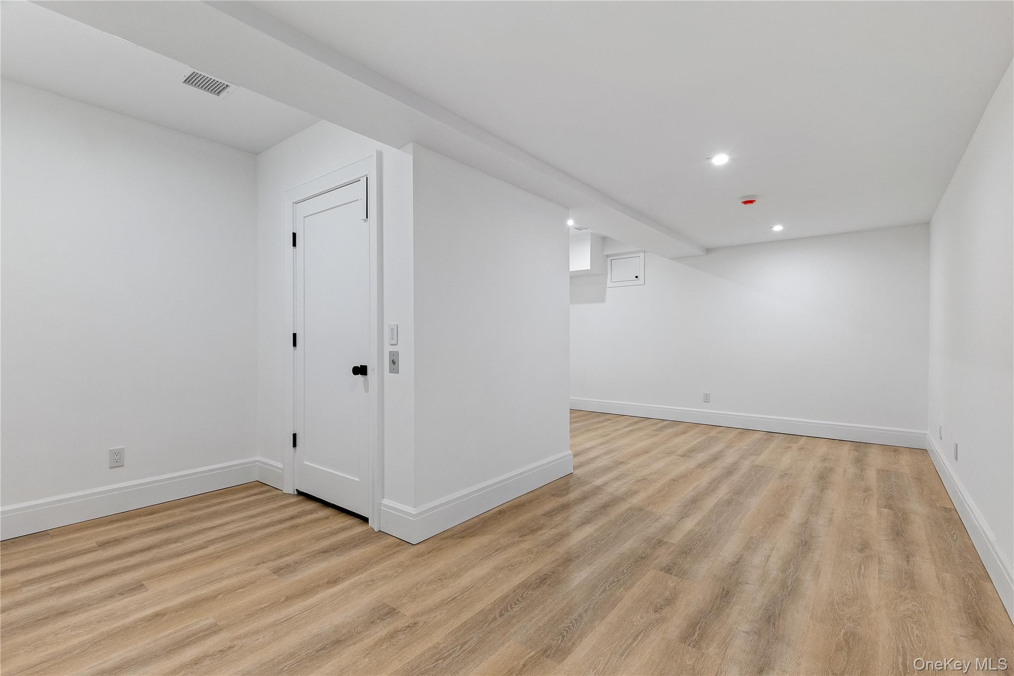 42 Mamaroneck Road Scarsdale, NY 10583 - Photo 41 of 47 An additional lower-level living area offers endless possibilities as a media room, fitness studio, playroom, or hobby space, with convenient elevator access.