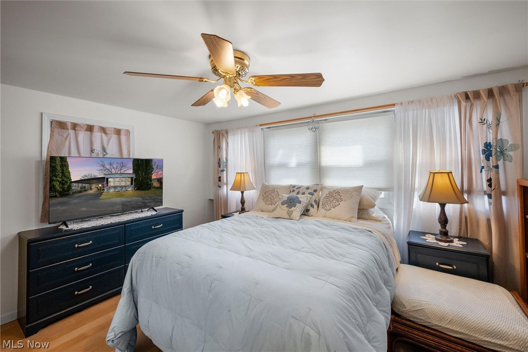 1623 Northeast Catawba Road, Unit 160 Port Clinton, OH 43452 - Photo 19 of 28 Bedroom with light wood laminate flooring