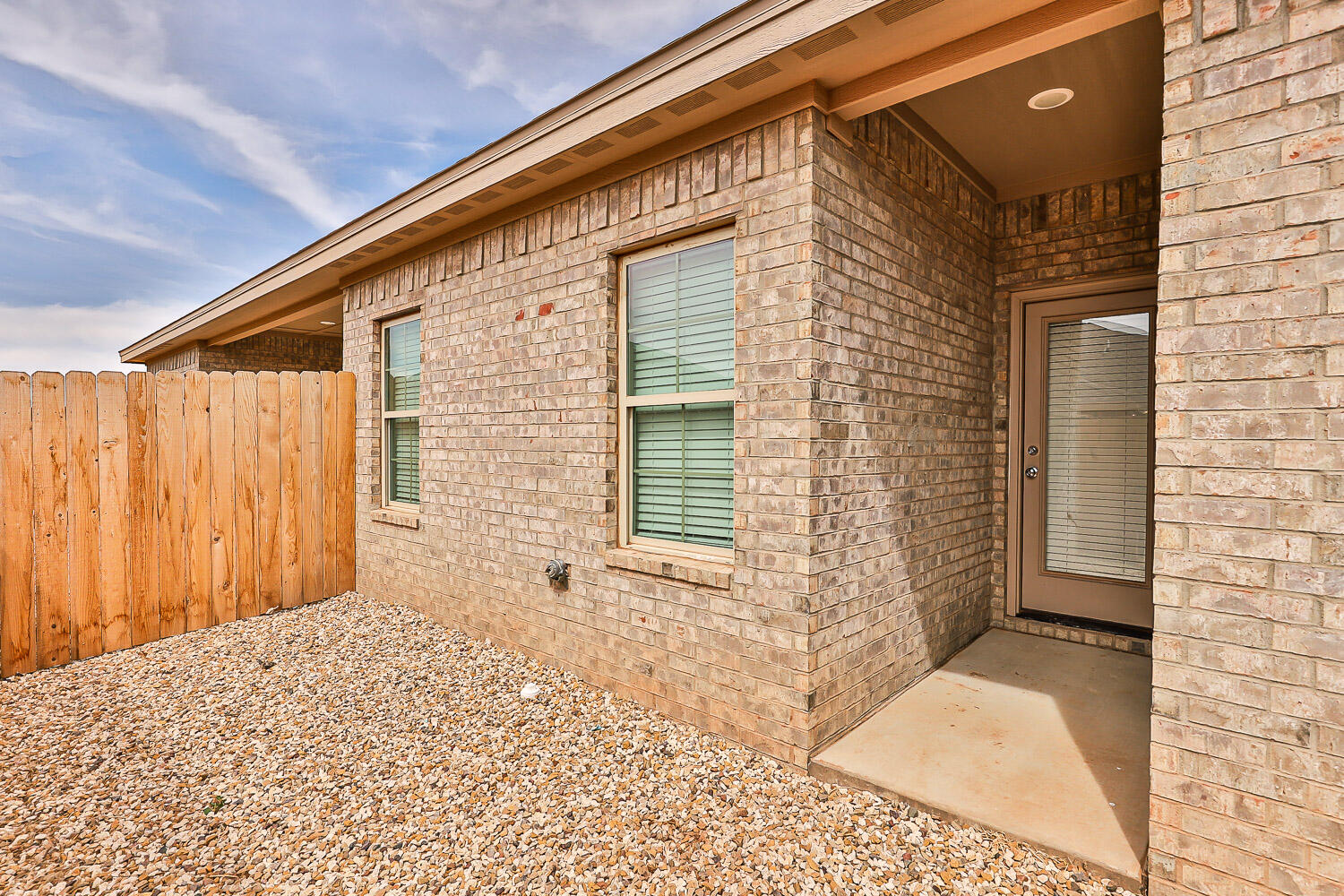5502 Kemper Street Lubbock, TX 79416 - Photo 17 of 17 a view of a house with a backyard