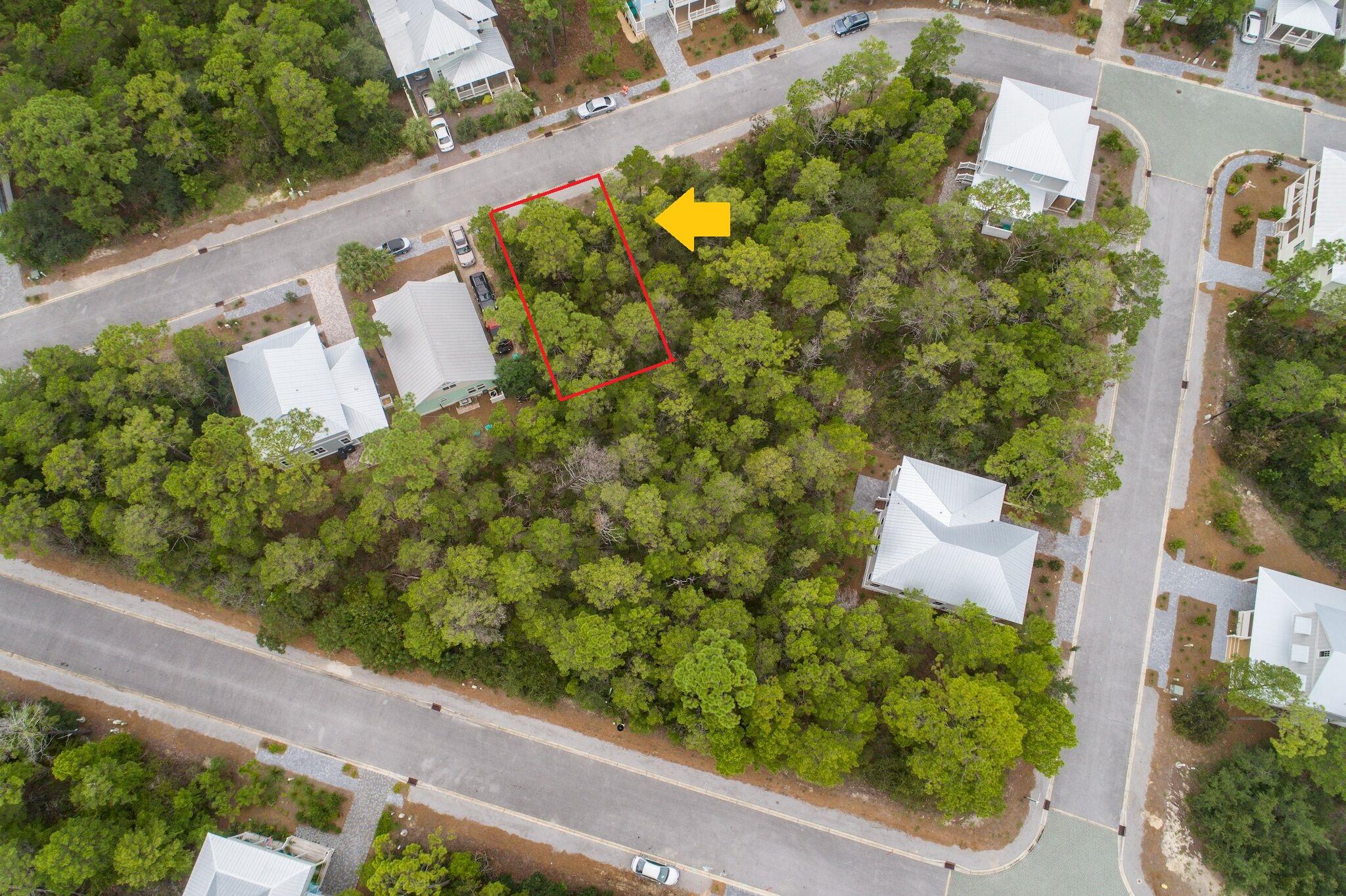 Lot 55 Matt's Way Santa Rosa Beach, FL 32459 - Photo 3 of 16 an aerial view of a house with a yard and garden