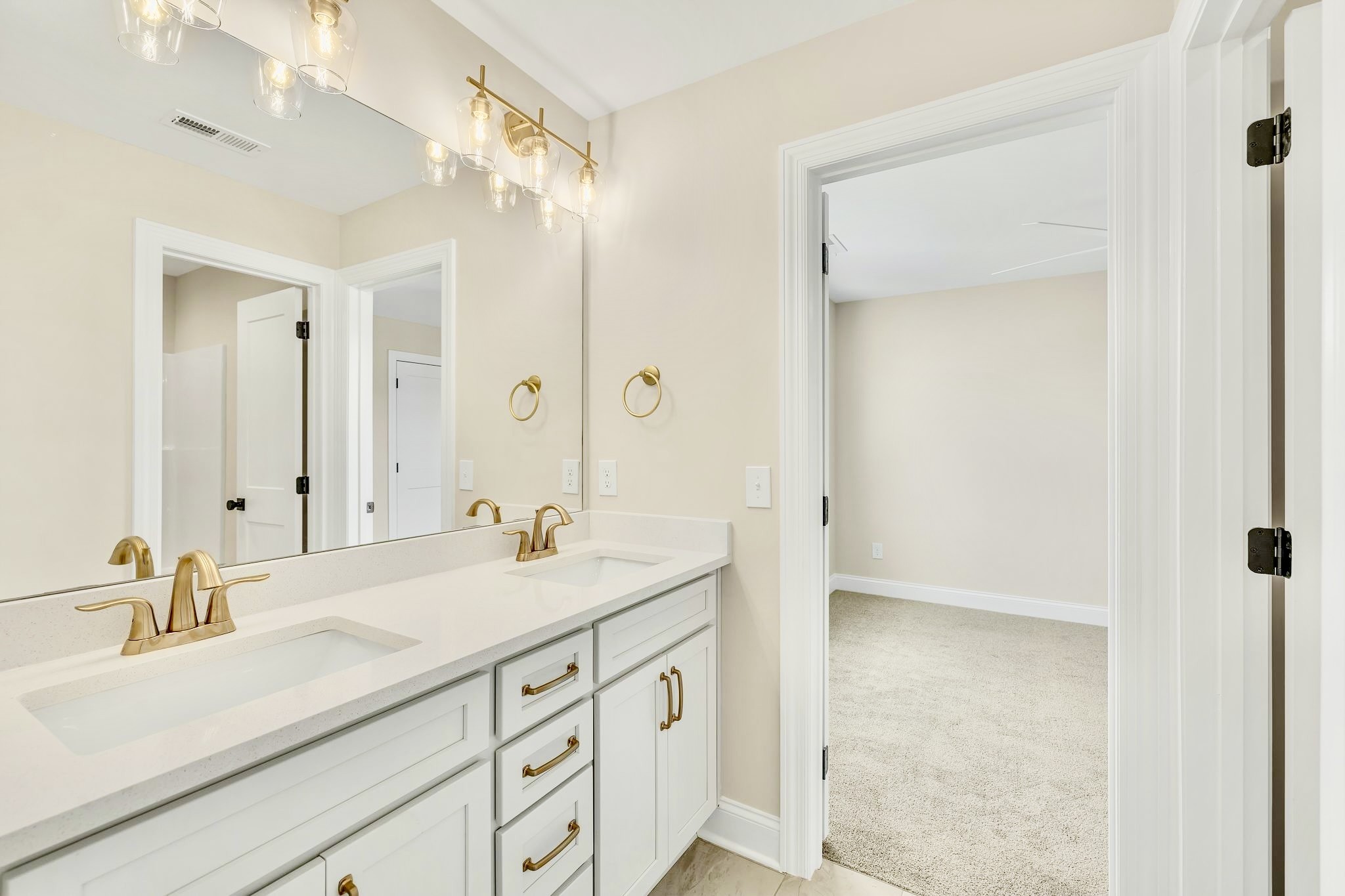 1905 Gracie Bug Loop Murfreesboro, TN 37128 - Photo 24 of 31 a bathroom with a sink double vanity and a mirror