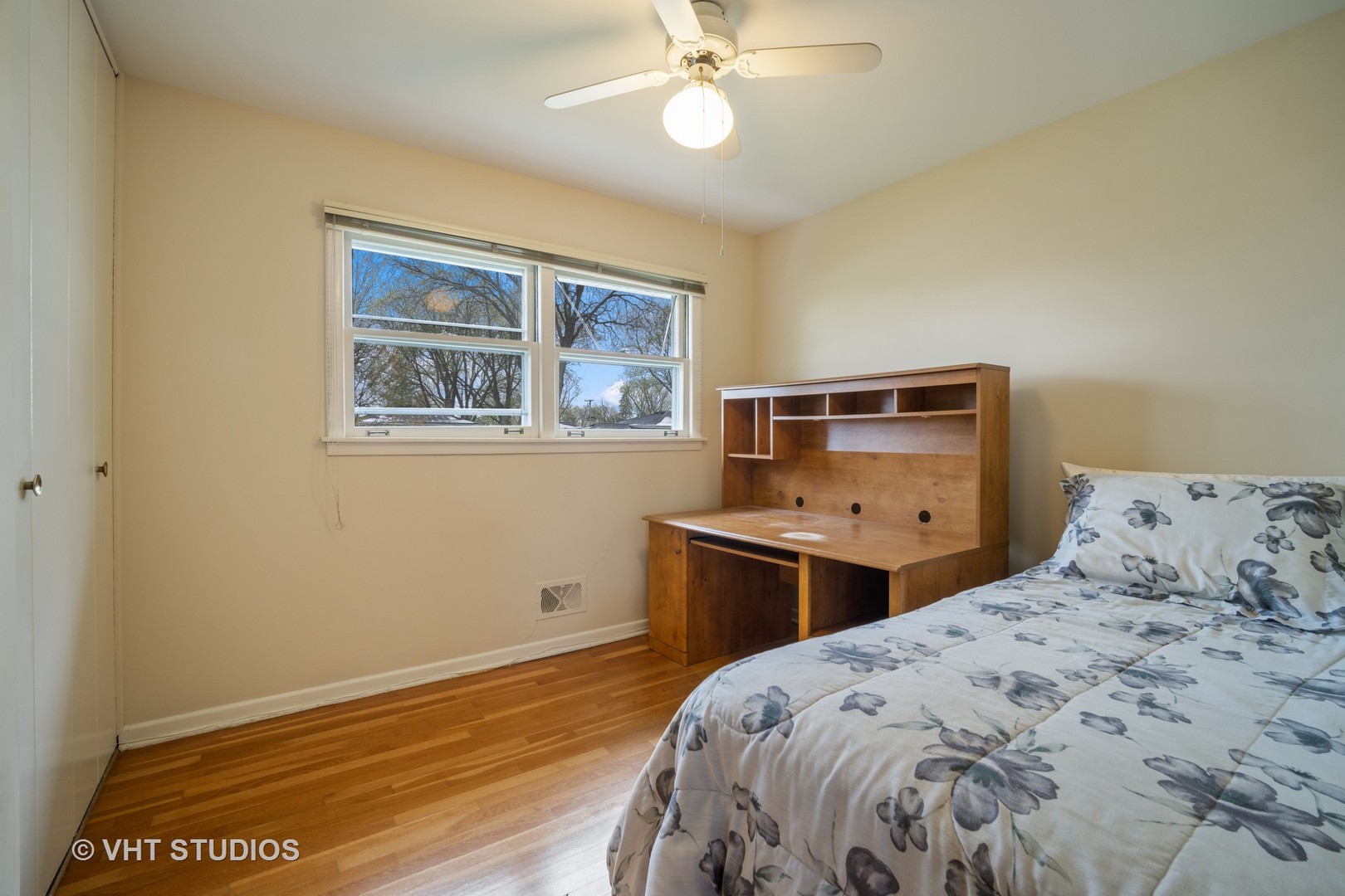 207 Michael Manor Glenview, IL 60025 - Photo 13 of 20 a bedroom with a bed and a chandelier