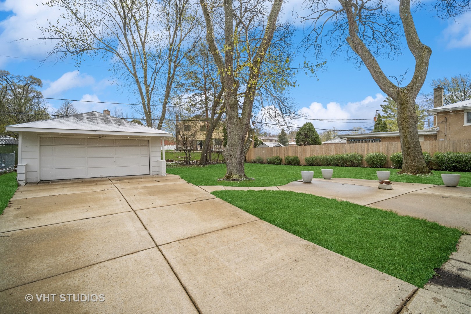 207 Michael Manor Glenview, IL 60025 - Photo 14 of 20 a view of a yard with brick house and a large tree