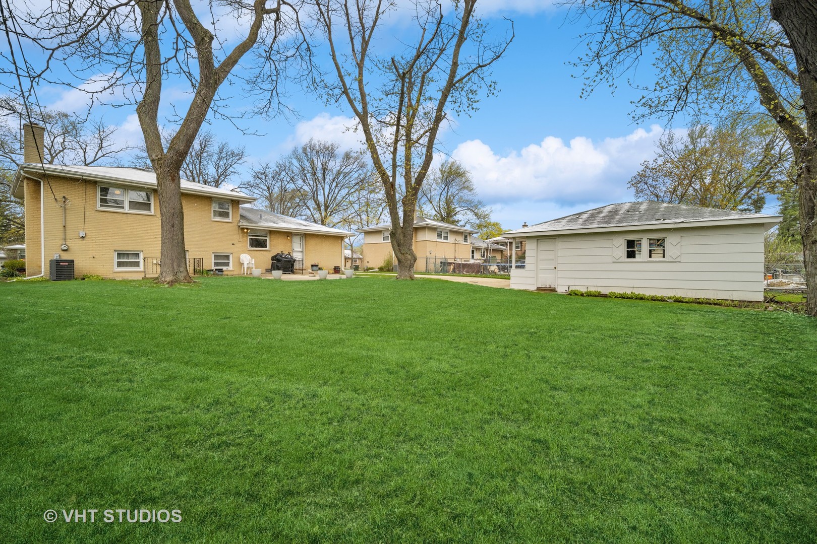 207 Michael Manor Glenview, IL 60025 - Photo 16 of 20 a view of a house with a yard