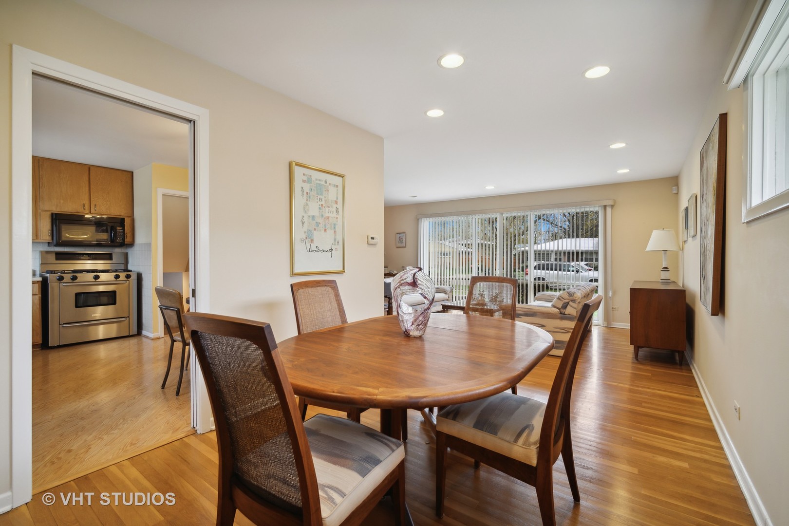 207 Michael Manor Glenview, IL 60025 - Photo 5 of 20 a view of a dining room with furniture window and wooden floor