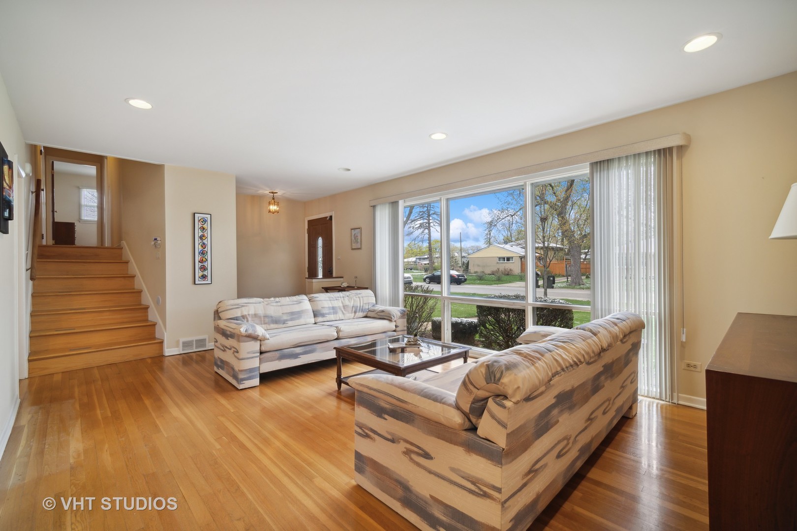 207 Michael Manor Glenview, IL 60025 - Photo 6 of 20 a living room with furniture and a large window