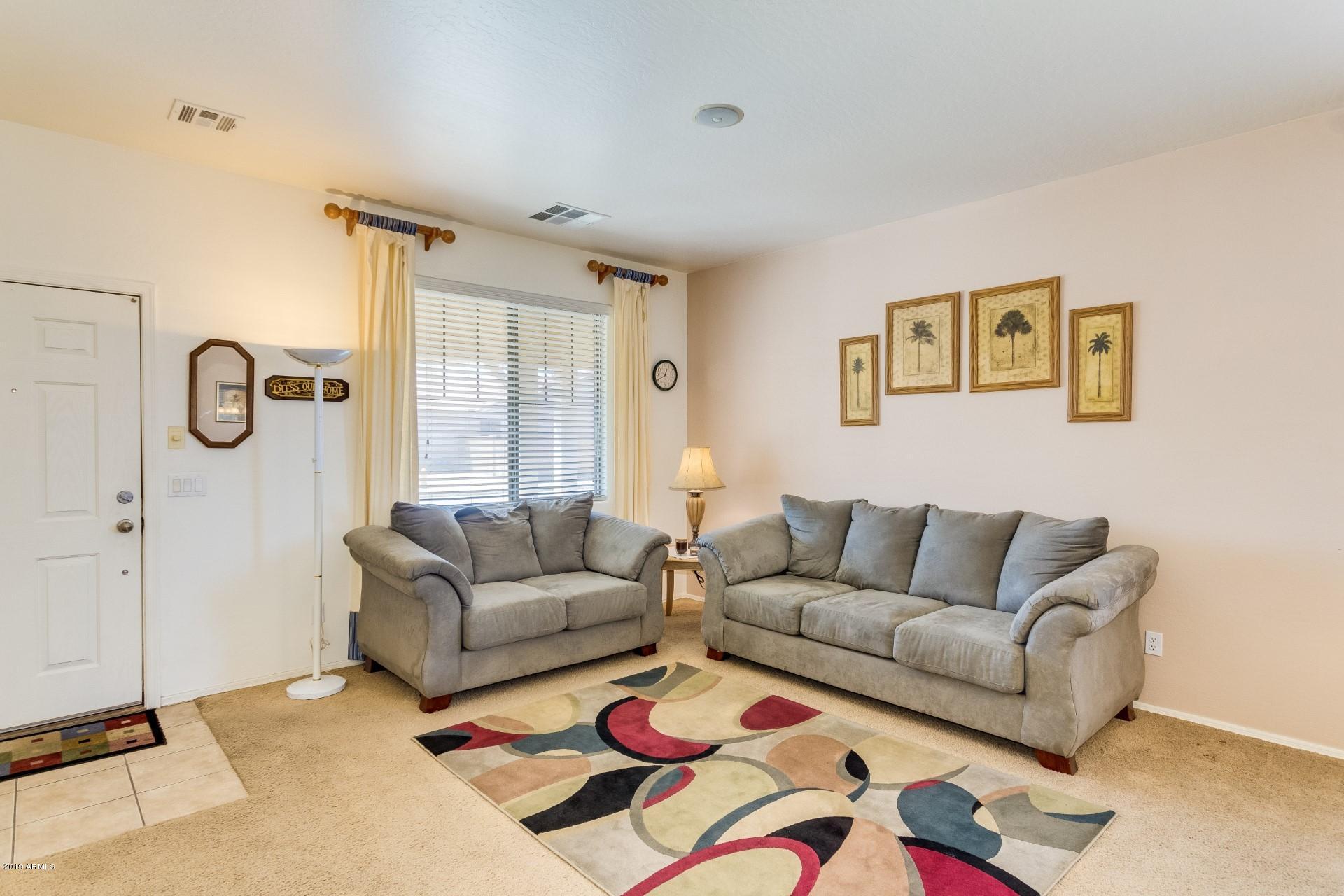 6826 West Darrel Road Laveen, AZ 85339 - Photo 6 of 31 darrel living room2