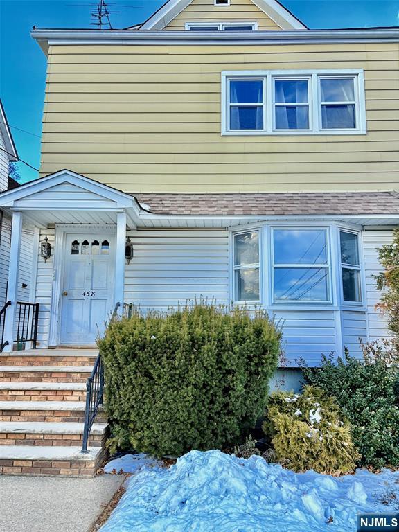 458 Totowa Road Totowa, NJ 07512 - Photo 1 of 10 a front view of a house with a garden