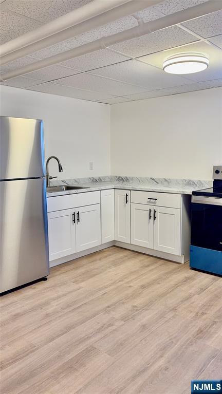 458 Totowa Road Totowa, NJ 07512 - Photo 2 of 10 a view of a kitchen with wooden floor