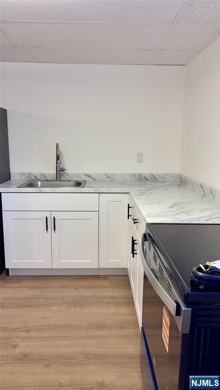 458 Totowa Road Totowa, NJ 07512 - Photo 3 of 10 a kitchen with granite countertop a sink and a stove