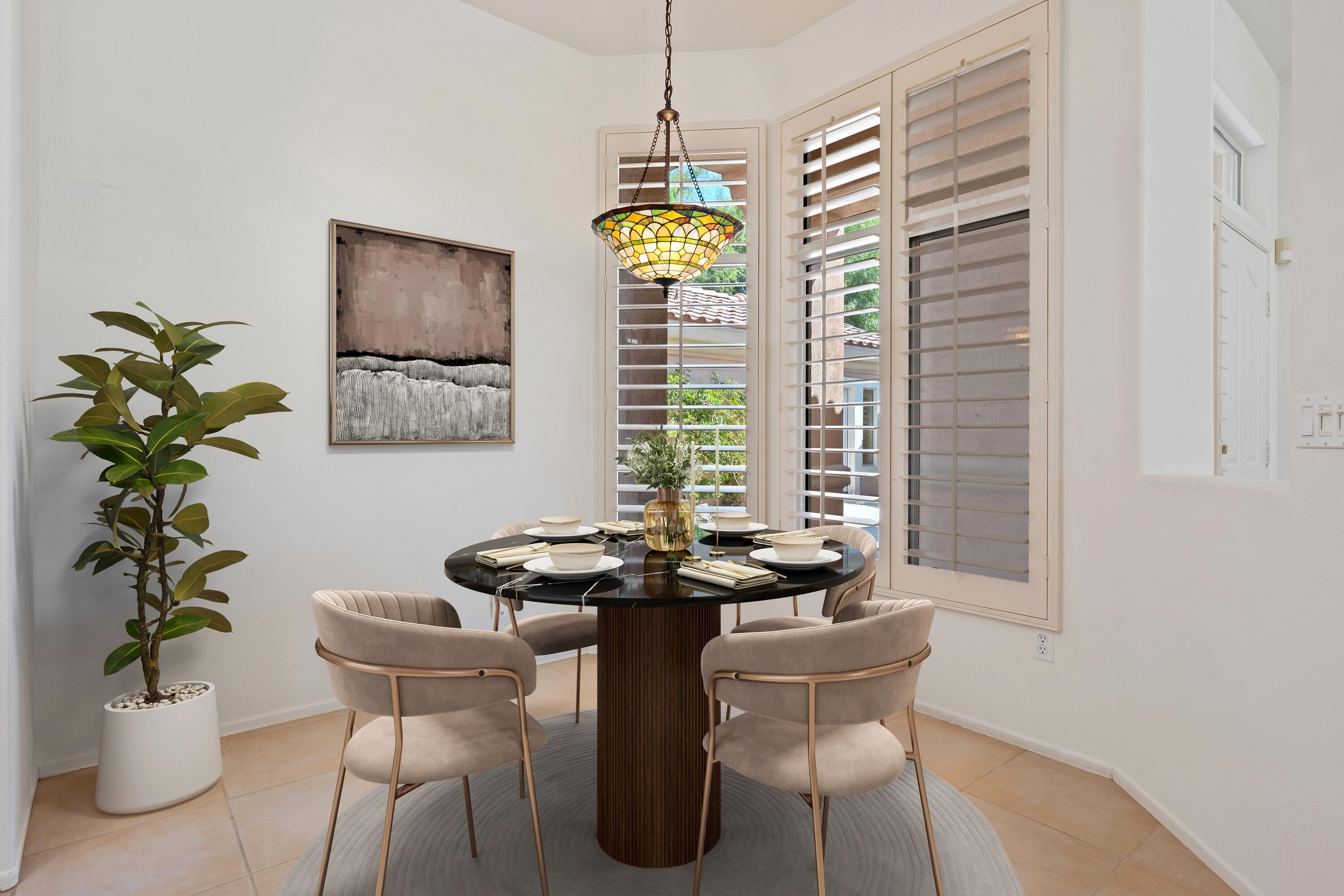 78513 Sunrise Mountain View Palm Desert, CA 92211 - Photo 23 of 45 a dining room with furniture and window