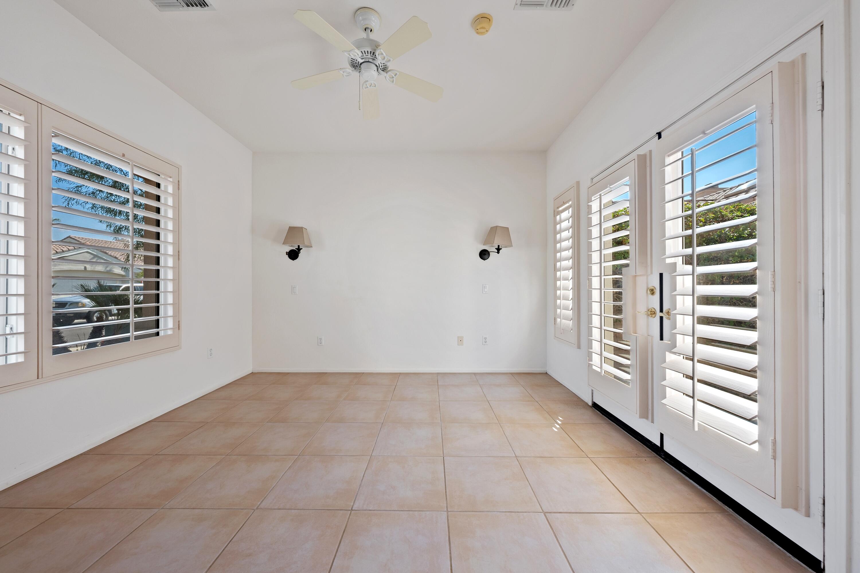 78513 Sunrise Mountain View Palm Desert, CA 92211 - Photo 35 of 45 a view of an empty room with a window
