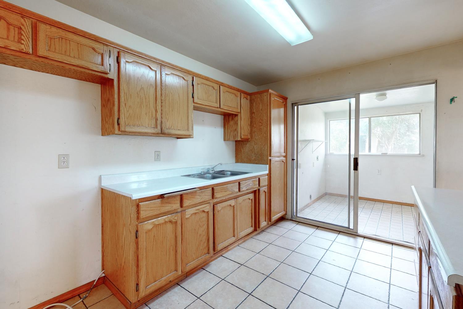 2065 Howlett Avenue Yuba City, CA 95993 - Photo 37 of 52 a kitchen with stainless steel appliances granite countertop a refrigerator and sink