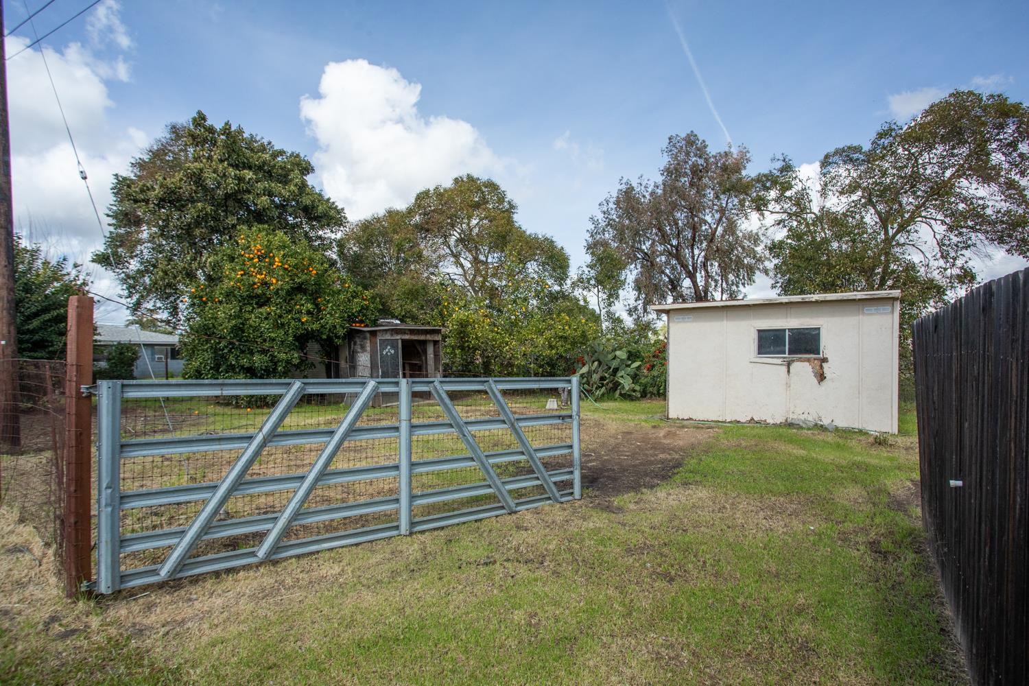 2065 Howlett Avenue Yuba City, CA 95993 - Photo 5 of 52 a view of backyard with deck and seating space