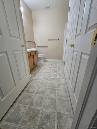 a bathroom with a sink and a toilet