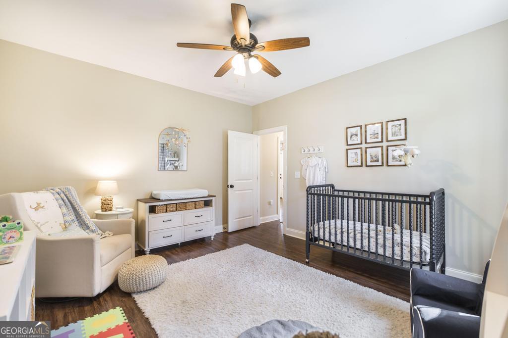 609 Live Oak Way Dublin, GA 31021 - Photo 30 of 37 a bedroom with furniture and a window