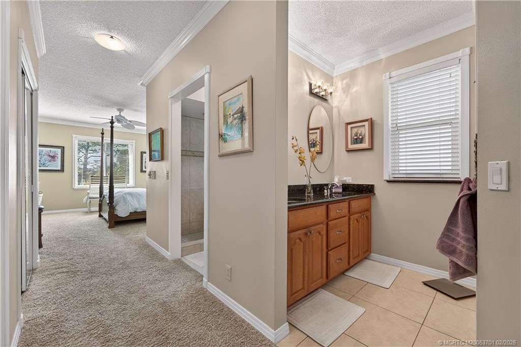 12415 Harbour Ridge Boulevard, Unit 48 Palm City, FL 34990 - Photo 15 of 34 Primary Suite