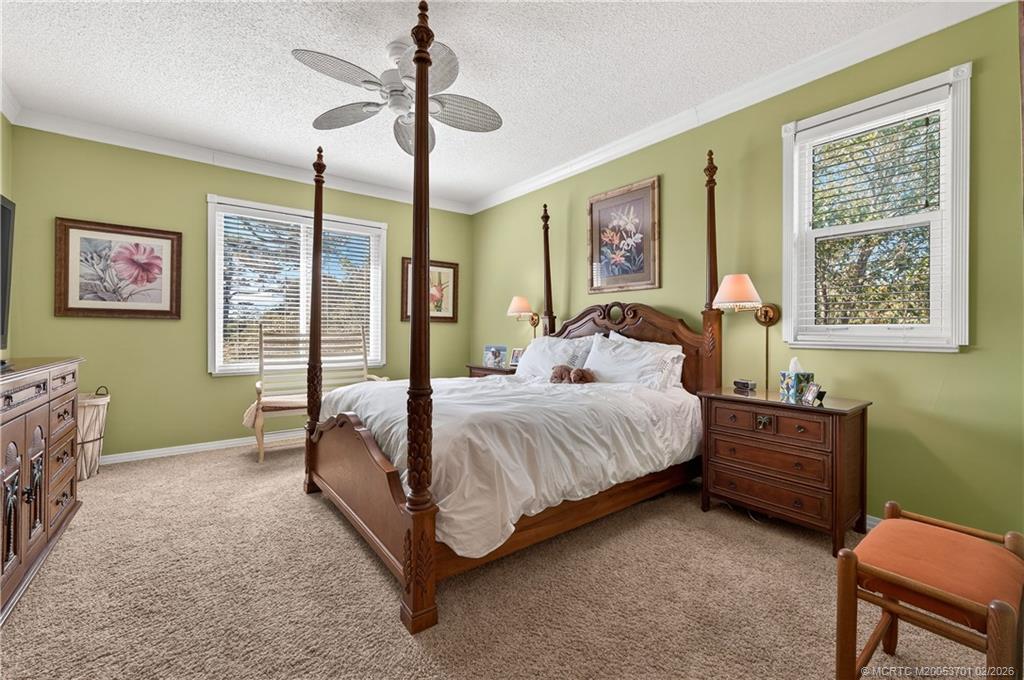 12415 Harbour Ridge Boulevard, Unit 48 Palm City, FL 34990 - Photo 16 of 34 Primary Suite