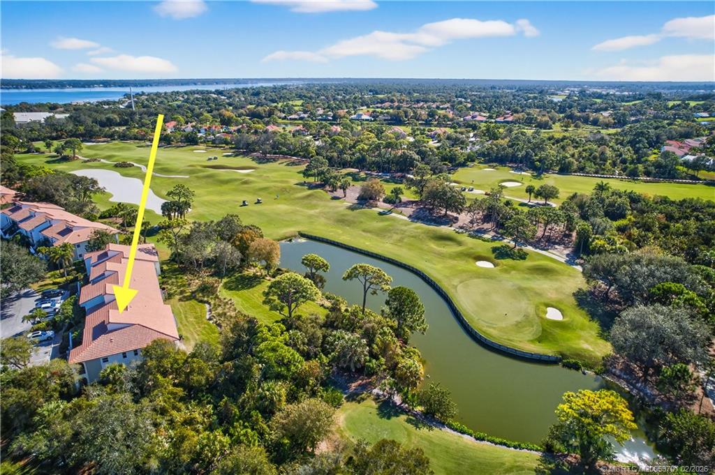 12415 Harbour Ridge Boulevard, Unit 48 Palm City, FL 34990 - Photo 28 of 34 an aerial view of a city