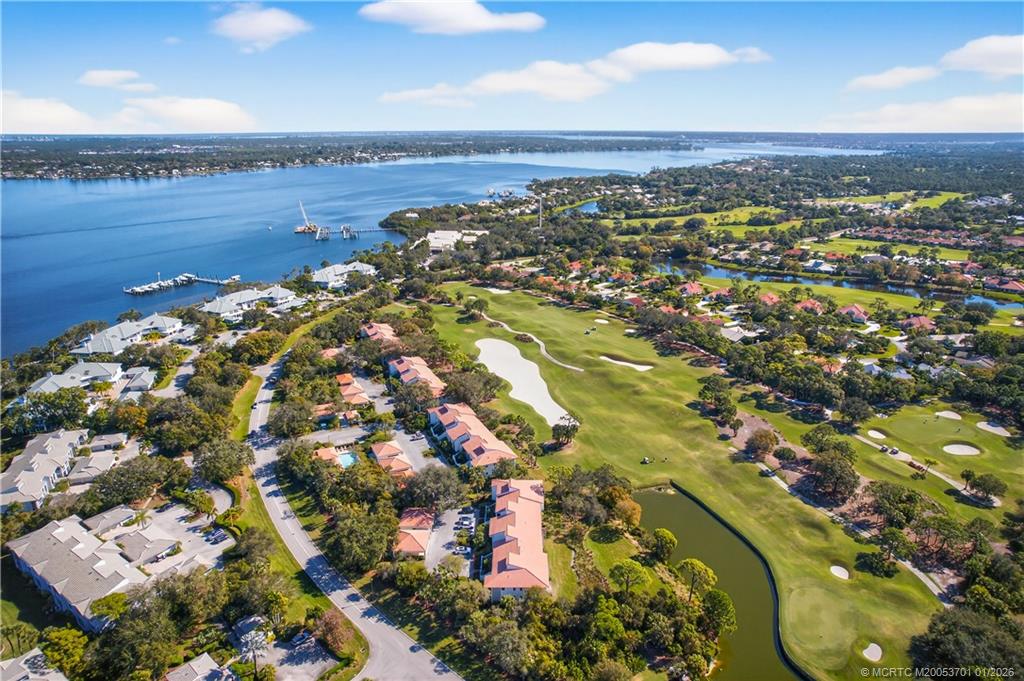 12415 Harbour Ridge Boulevard, Unit 48 Palm City, FL 34990 - Photo 30 of 34 an aerial view of a city