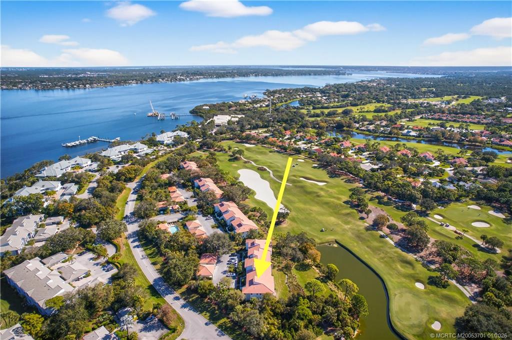 12415 Harbour Ridge Boulevard, Unit 48 Palm City, FL 34990 - Photo 31 of 34 an aerial view of residential building with outdoor space