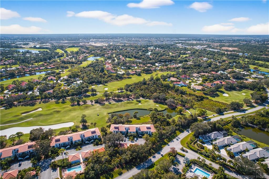 12415 Harbour Ridge Boulevard, Unit 48 Palm City, FL 34990 - Photo 32 of 34 an aerial view of residential building and ocean