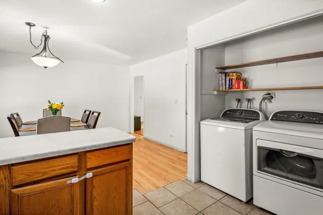 a bedroom with a bed and cabinets