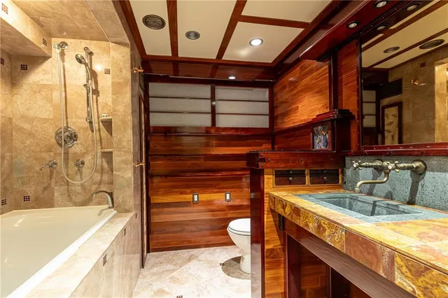 a bathroom with a sink and a bathtub