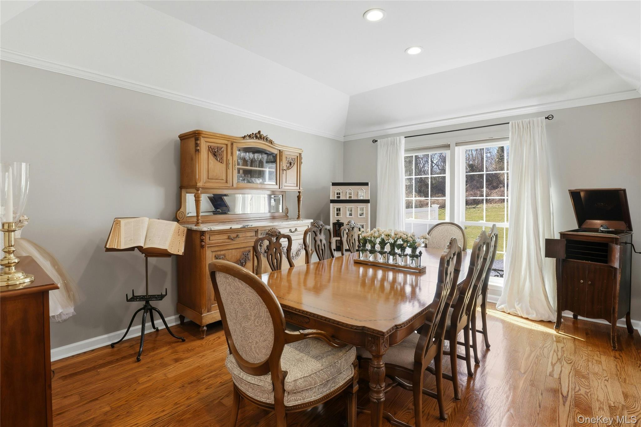 78 Hidden Ridge Drive Syosset, NY 11791 - Photo 8 of 21 a view of a dining room with furniture window and wooden floor