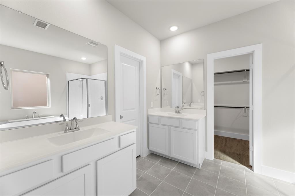 2359 Bell Way Forney, TX 75126 - Photo 19 of 31 a bathroom with a sink and a mirror