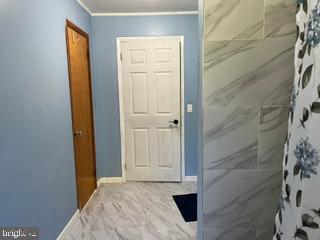105 Penn Lyle Road Princeton Junction, NJ 08550 - Photo 5 of 8 Hallway Bathroom with Tub & Vanity