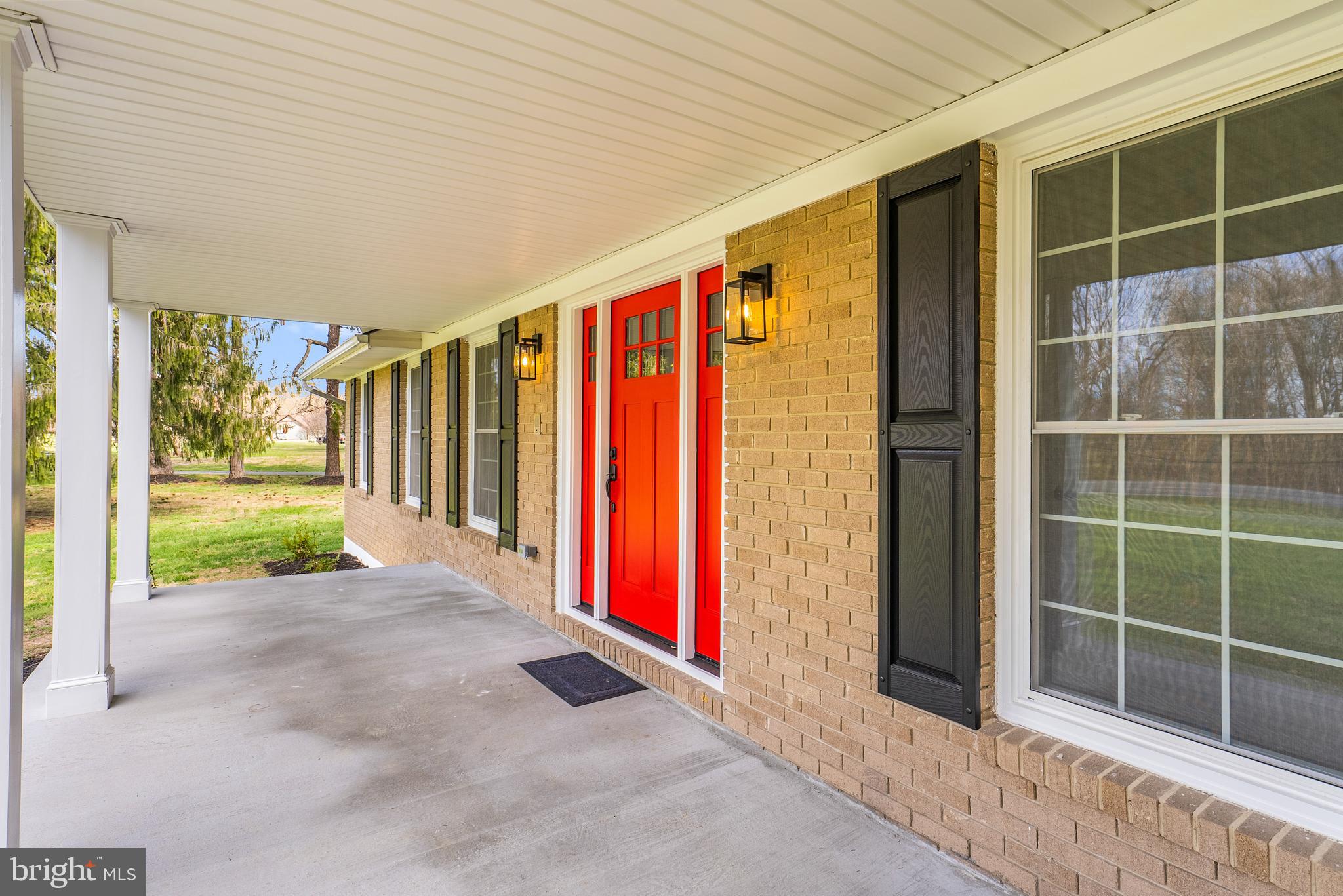 5485 Solomons Island Road Lothian, MD 20711 - Photo 12 of 64 a view of outdoor space with wooden floor and fence