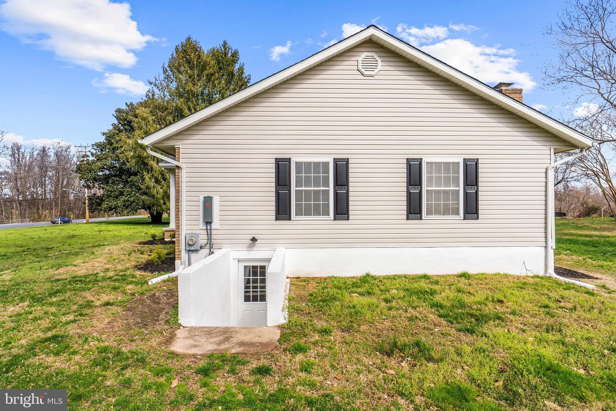 5485 Solomons Island Road Lothian, MD 20711 - Photo 16 of 64 a view of a house with backyard