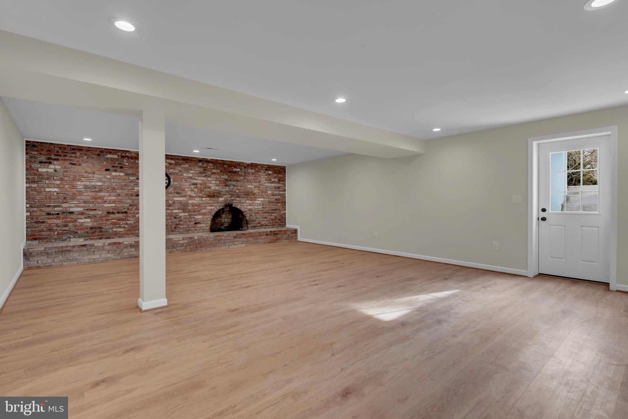 5485 Solomons Island Road Lothian, MD 20711 - Photo 17 of 64 a view of empty room with wooden floor