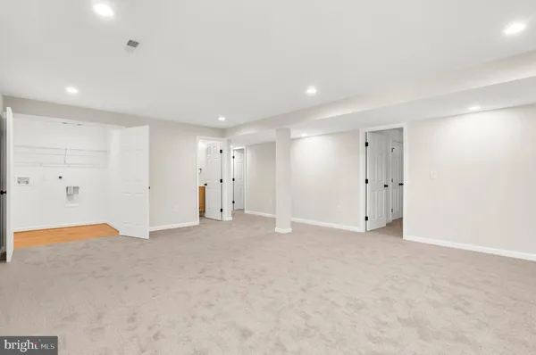 a view of a room with an empty space
