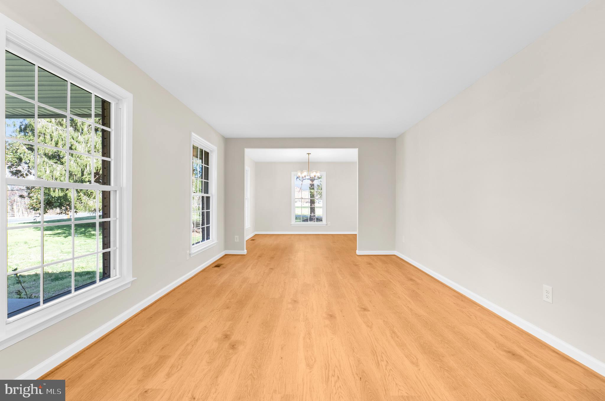 5485 Solomons Island Road Lothian, MD 20711 - Photo 44 of 64 a view of a big room with windows