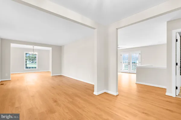 a kitchen with stainless steel appliances a refrigerator sink and microwave