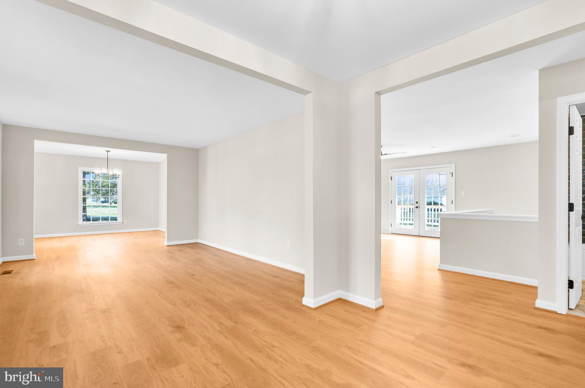 5485 Solomons Island Road Lothian, MD 20711 - Photo 45 of 64 a view of empty room with wooden floor